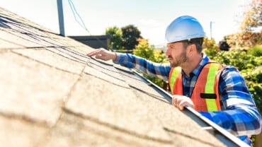 Roofing Inspection Being Done BY Man In Hardhat | Miceli Roofing